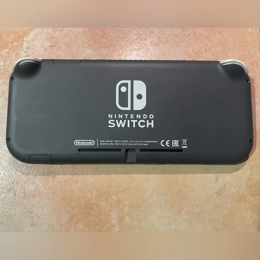 Nintendo Switch Lite Gray - Portable with 3 games + Charger Included